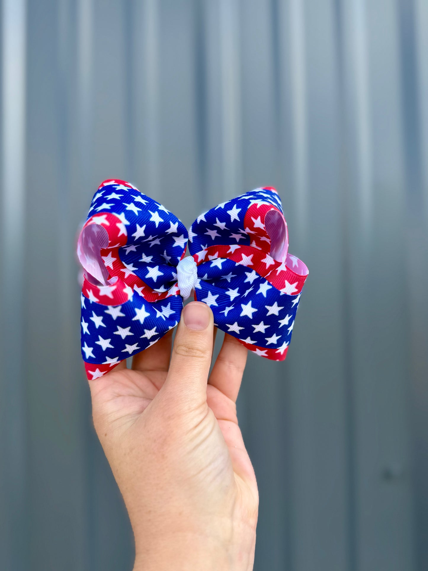 Red and blue stars ribbon bow