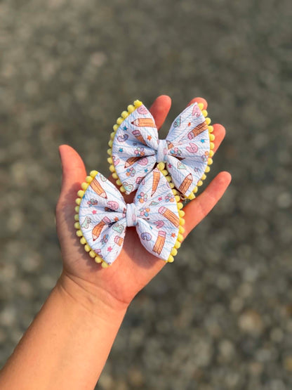 pencil alphabet pattern bows with trim