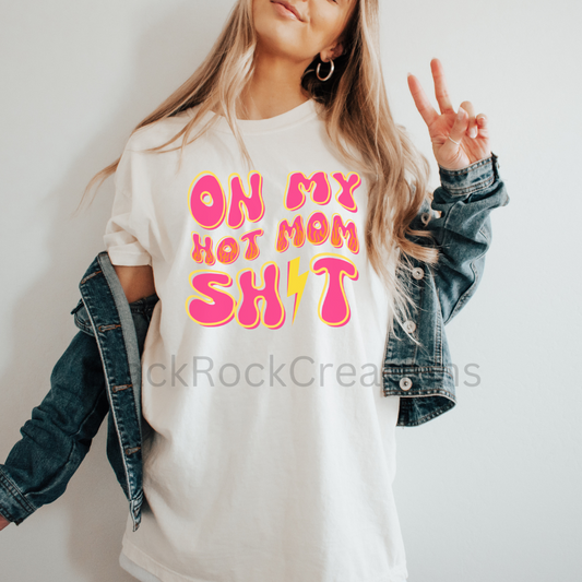 On my Hot mom sh!t comfort colors tshirt